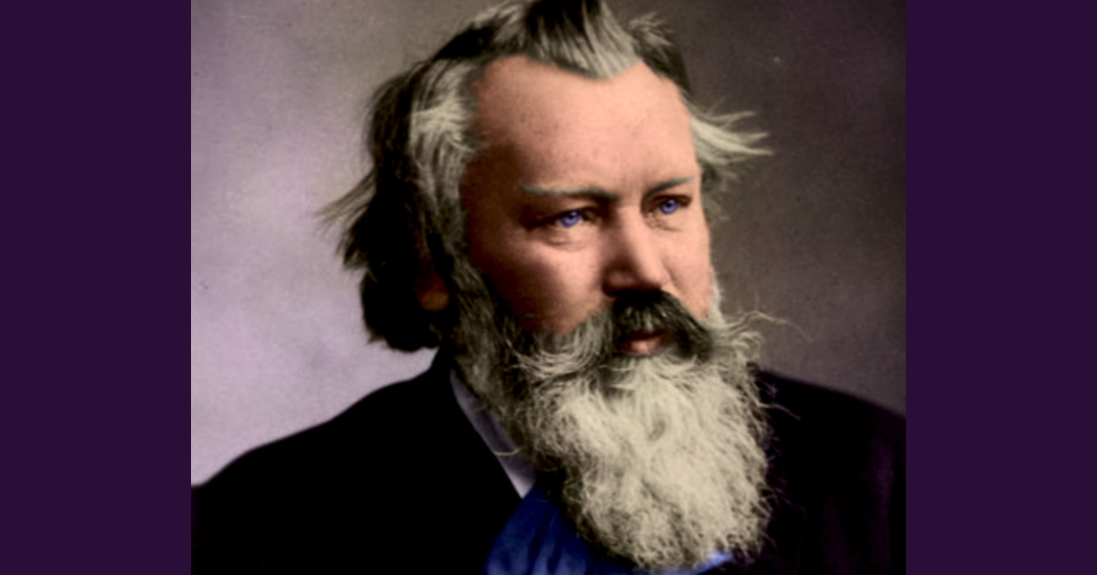 Johannes Brahms (1833–1897) German composer in front of a bookshelf